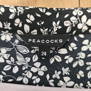 Dress. Size 24. Light weight material. Brand Peacock.